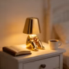 Shoppy golden little figure table lamp