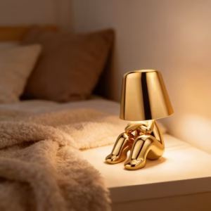 Shoppy golden little figure table lamp